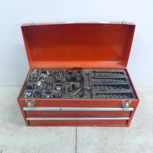 2036 - A red metal tool box with two drawers including sockets, screwdriver heads, wrenches, etc. 2 empty w... 