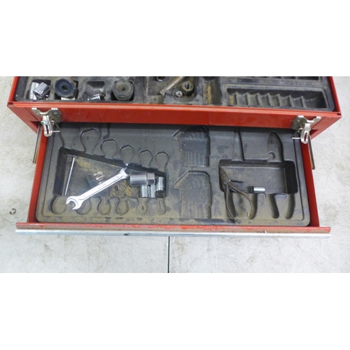 2036 - A red metal tool box with two drawers including sockets, screwdriver heads, wrenches, etc. 2 empty w... 