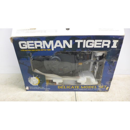 2078 - A German Tiger I, 1/16 scale radio controlled battle tank and a Flying Gadgets X-Cam remote controll... 