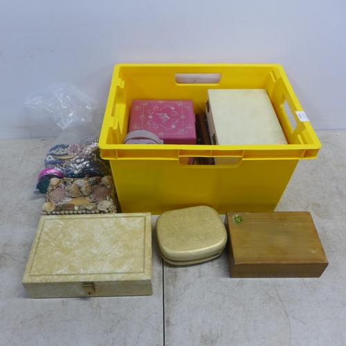 2081 - A bag of costume jewellery and various empty jewellery boxes