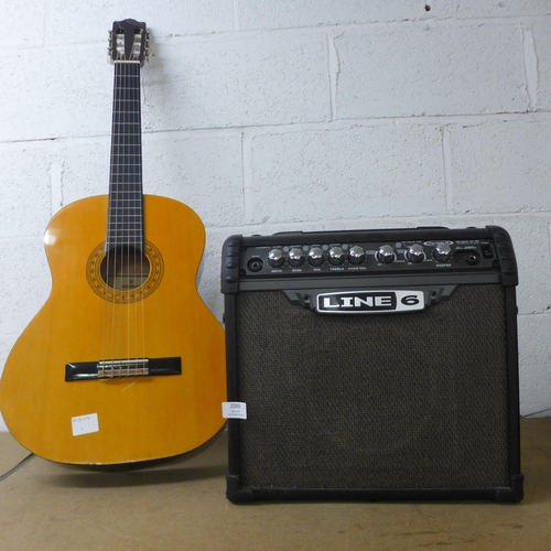 2089 - A Hohner MC-05 acoustic guitar and an A Line 6 Spider III 15 practice amp