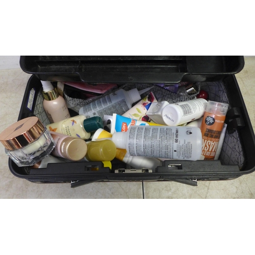 2094 - A case full of lady's makeup including Colour Fix Revolution Pro Fix travel wash and a bag of nail v... 