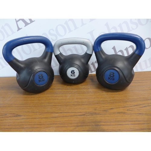 2275 - Three kettle bell weights including two 8kg and a 6kg and a set of 10kg Domyos Dumbbell weights