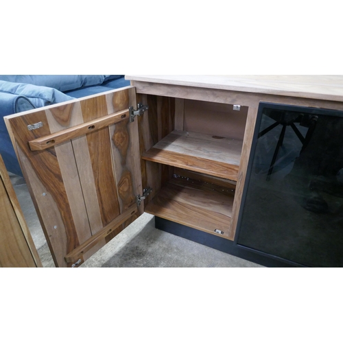 1417 - A three door sideboard with glass centre door  *This lot is subject to VAT