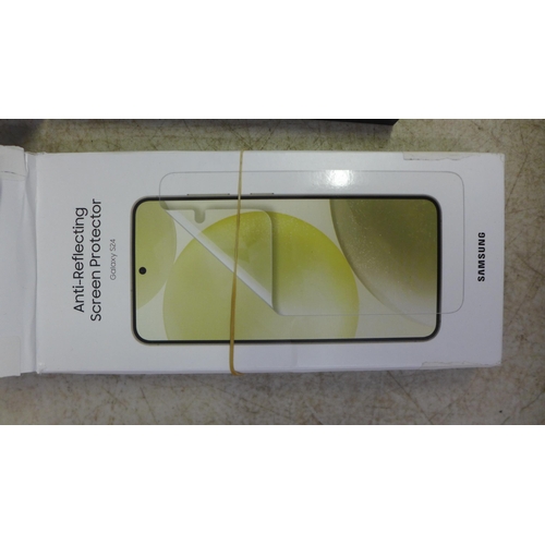 2105 - A Galaxy S24 smart phone in a box, 128GB with charging cable, screen protector and case