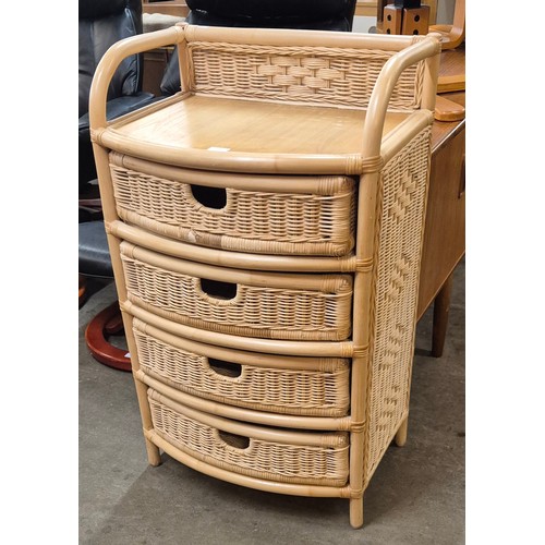 251 - A bamboo and rattan bowfront chest of drawers