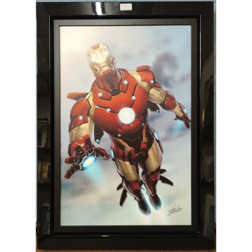 91 - A limited edition Marvels, Ironman print on canvas, signed by Stan Lee, 67 x 45cms, C.O.A. verso, fr... 