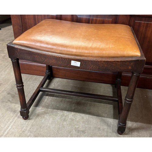 281 - A George III style oak and tan leather upholstered stool