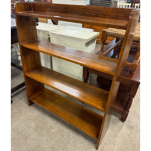 327 - An early 20th Century oak open bookcase