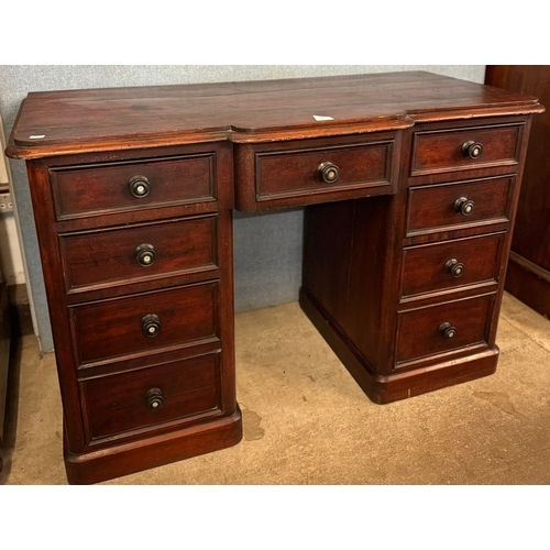 282 - A Victorian pine kneehole desk