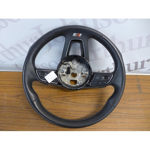 2301 - Two Audi A series steering wheels