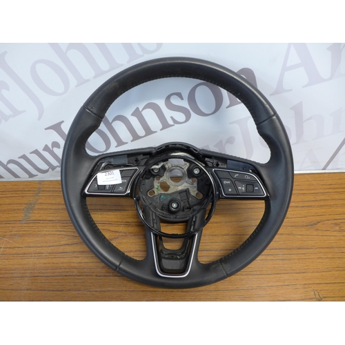 2301 - Two Audi A series steering wheels