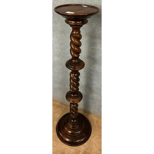 284 - An early 20th Century beech barleytwist torchere