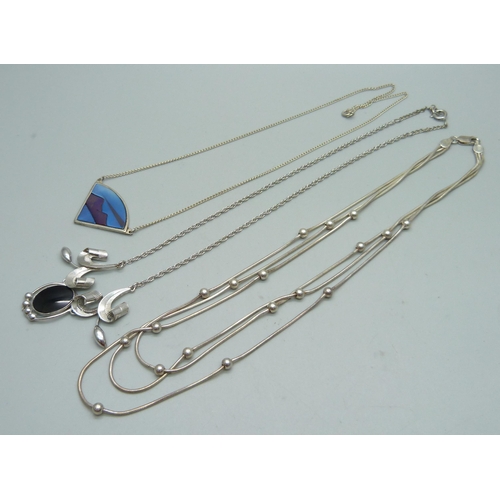 1010 - Three silver necklets, 34g