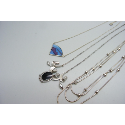 1010 - Three silver necklets, 34g