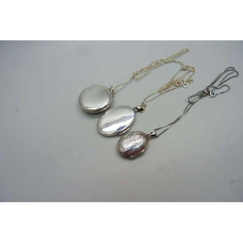 1013 - Three silver lockets and chains