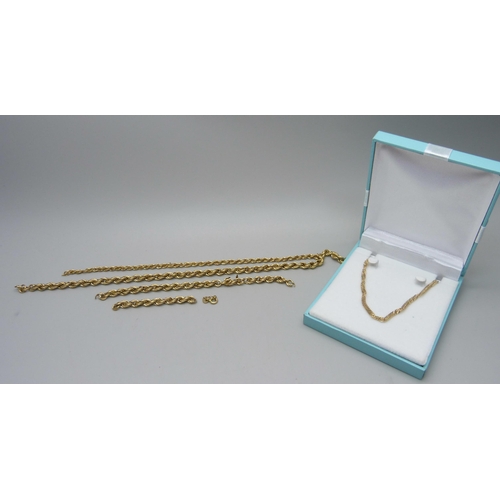 1017 - A 9ct gold bracelet, 2.1g, and yellow metal rope twist chains, a/f, (rope chains 7g)