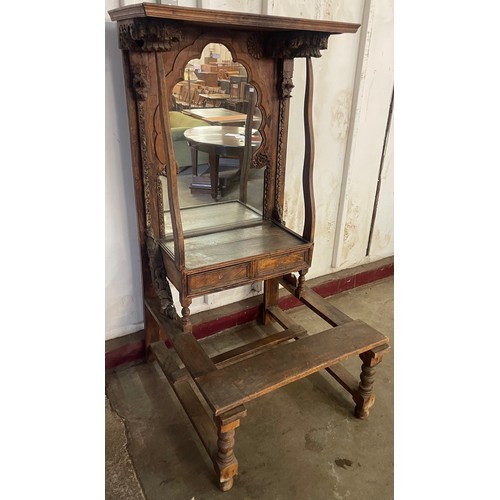 346 - A far eastern carved wood mirrorback side cabinet