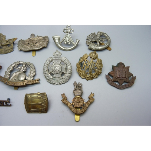 1028 - A collection of military regimental badges, 15 in total