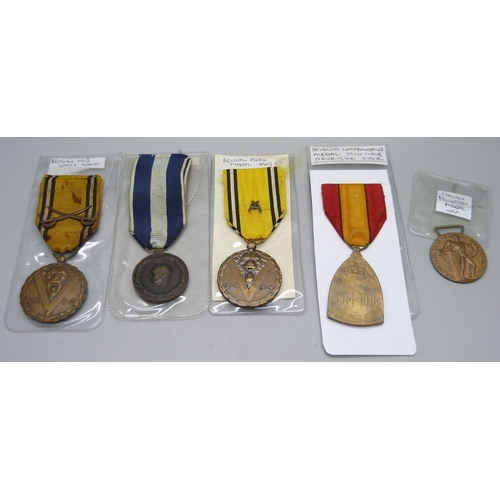 1031 - Three Belgian medals; 1914-1918 and two WWII including Peace Medal, a Greek 1940-41 medal and an Ita... 