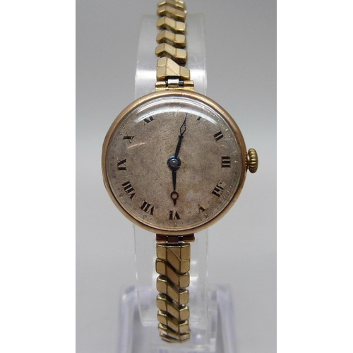 1040 - A lady's 9ct gold cased Rolex wristwatch, the movement and inner case stamped Rolex, London import m... 