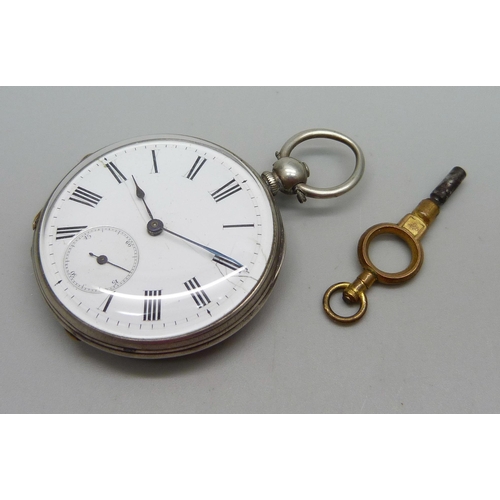 1048 - A silver fob watch with key