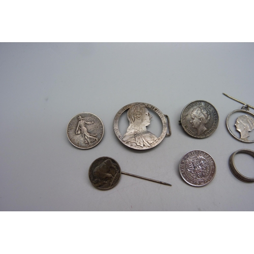 1063 - A collection of coin brooches and pendants, etc., including an enamelled four pence pin