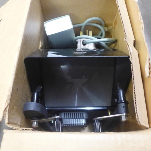 1089 - A box with two digital video cameras, Panasonic NV-DX110 DVC and Canon Legria HFS21 and accessories,... 