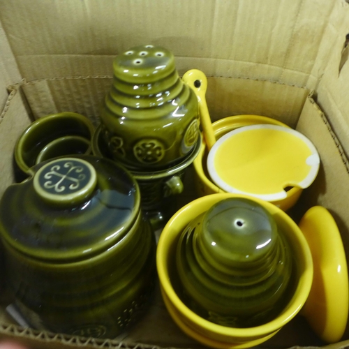 1104 - Three boxes of items including a bagatelle board, novelty storage jars, salt and pepper pots, a Shea... 