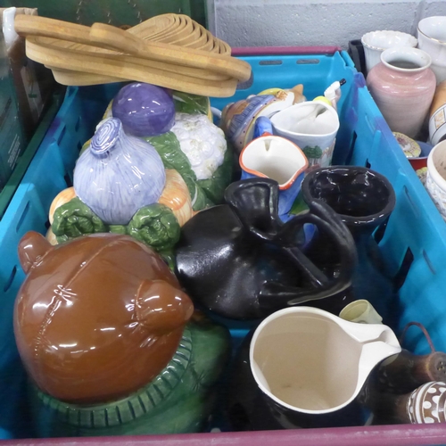 1104 - Three boxes of items including a bagatelle board, novelty storage jars, salt and pepper pots, a Shea... 