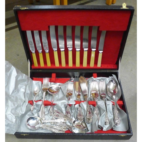 1120 - Two boxes of metal wares, several pewter tankards, plated flatware, other pewter, etc. **PLEASE NOTE... 