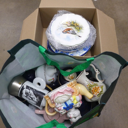 1121 - A box of mixed china, tea pots, Elvis Presley coffee pot, British and Continental plates **PLEASE NO... 