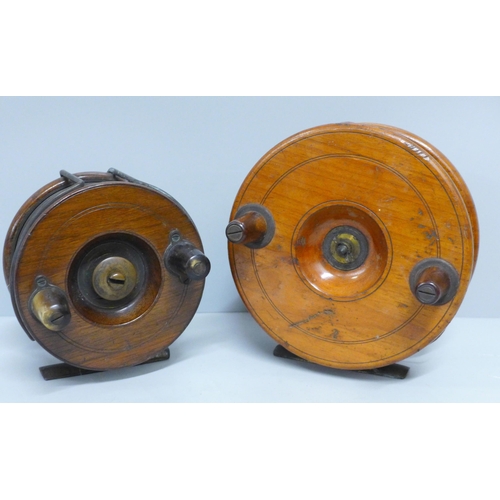 609 - Two brass and wooden salmon fishing reels, smaller engraved C Farlow & Co Makers, 191 Strand, London