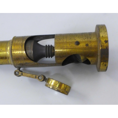 613 - A 19th Century gilt brass magnifier, 15.5cm