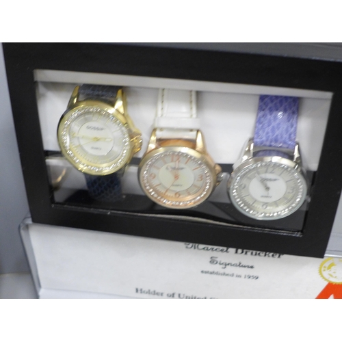 618 - Seven modern wristwatches and a small travel clock