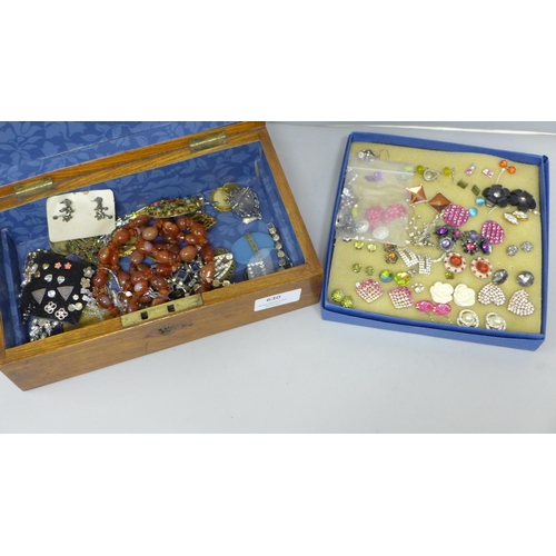 630 - A collection of costume jewellery in a wood box plus a tray of costume earrings