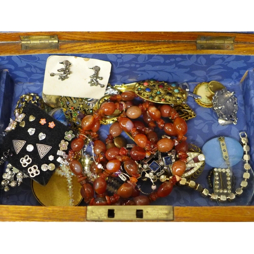 630 - A collection of costume jewellery in a wood box plus a tray of costume earrings