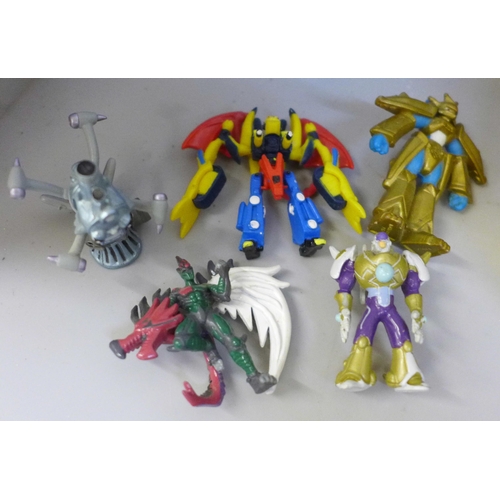 644 - Vintage Yu-Gi-Oh! Tazos and figures and a collection of Pokemon open pack artwork including Evolving... 