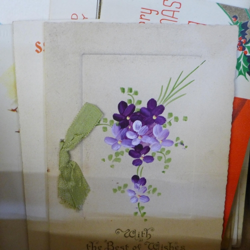 645 - A collection of greetings cards, Edwardian and later