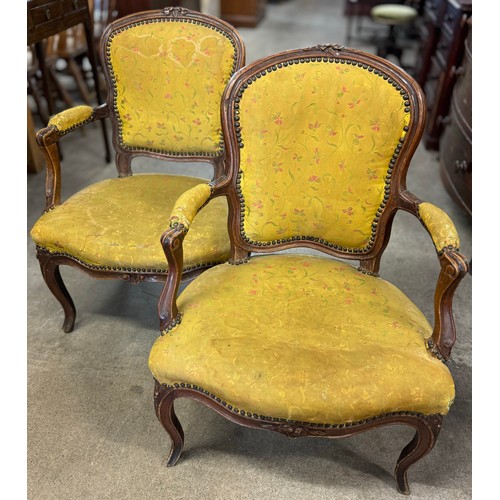 292 - A pair of French carved beech and fabric upholstered bedroom chairs