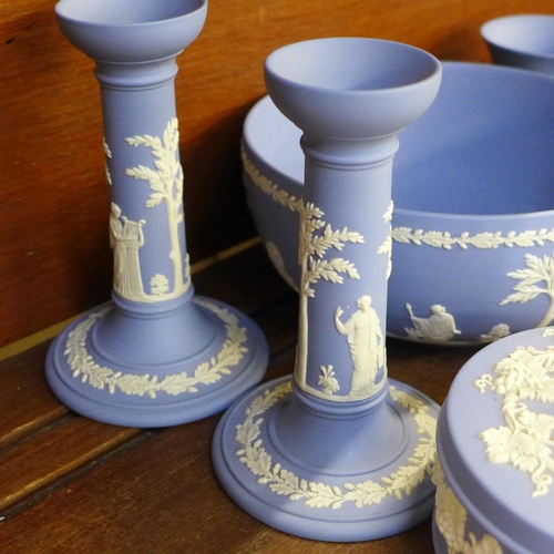 660 - A collection of 1950s/1960s Wedgwood Jasperware, a pair of candlesticks, two vases, three pots and a... 