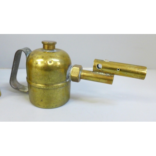 669 - A brass blow torch, small brass burner and a Welsh miniature miner's lamp