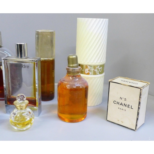 683 - A collection of vintage perfumes, including Opium and Givenchy, Chanel box, some incomplete