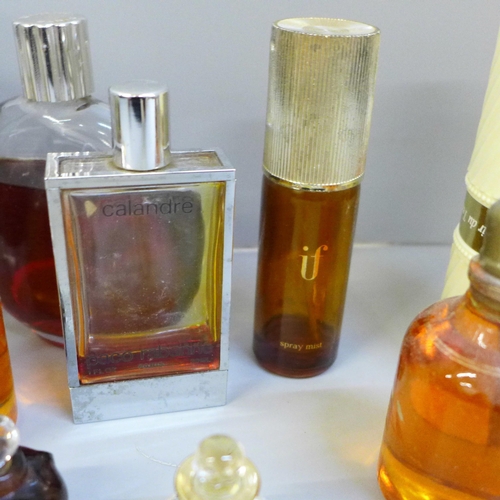 683 - A collection of vintage perfumes, including Opium and Givenchy, Chanel box, some incomplete