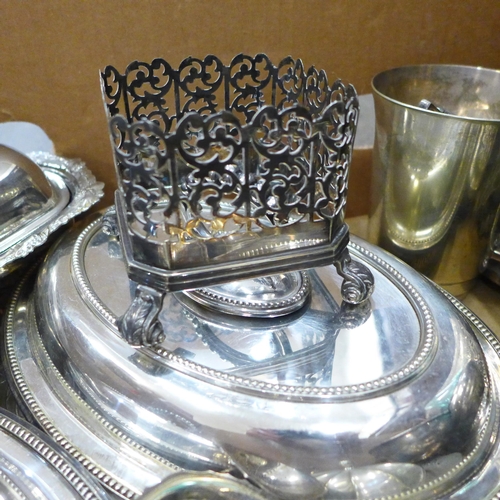 706 - A collection of silver plate including a pair of vegetable serving dishes, salvers, etc.