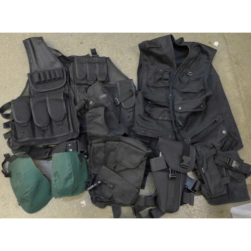 720 - A collection of hunting accessories including a gun holster, gilet, knee pads, etc.