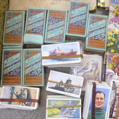 728 - A collection of cigarette cards and tea cards