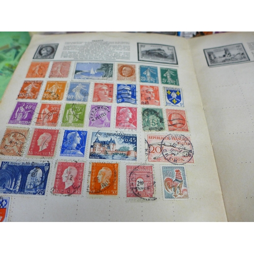 755 - Three stamp albums and a folder of loose stamps