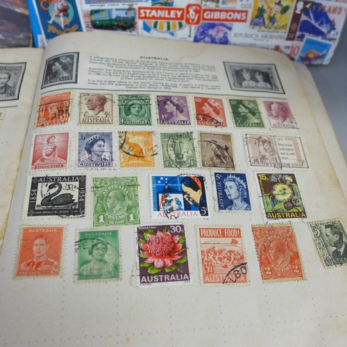 755 - Three stamp albums and a folder of loose stamps