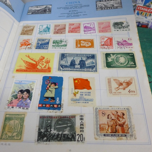 755 - Three stamp albums and a folder of loose stamps